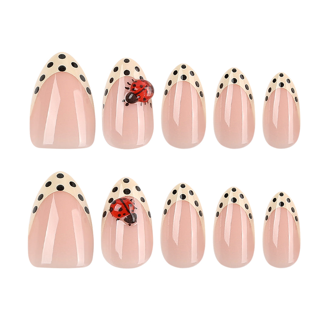 Artful nail art with ladybug motif and polka dots Bowlift
