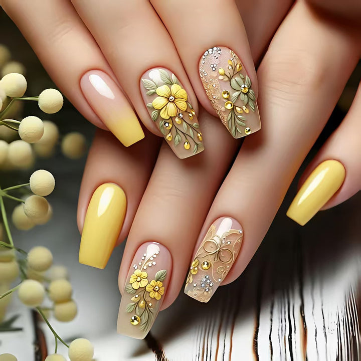 Artificial nails with floral embellishments and glitter Bowlift