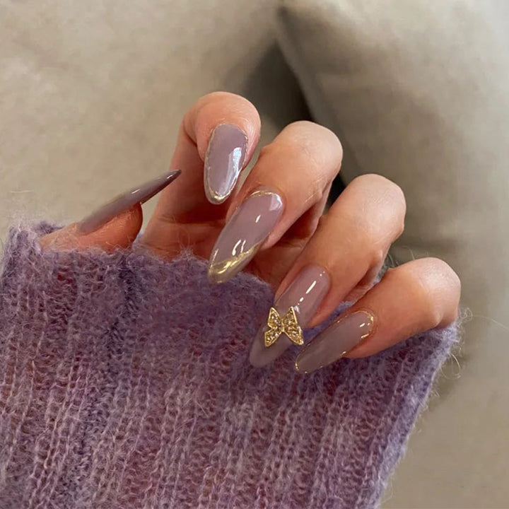 Elegant fake nails with glitter accents Bowlift