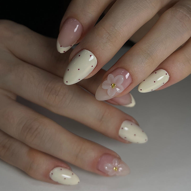 Elegant Press-On Nail Set with Floral and Polka Dot Designs Bowlift