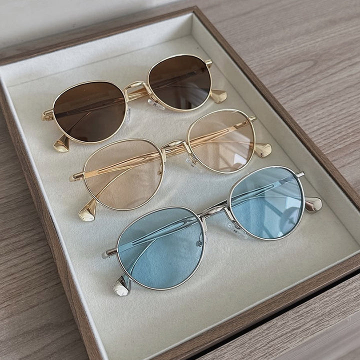 Women's round sunglasses with elegant metal frame and UV protection Bowlift