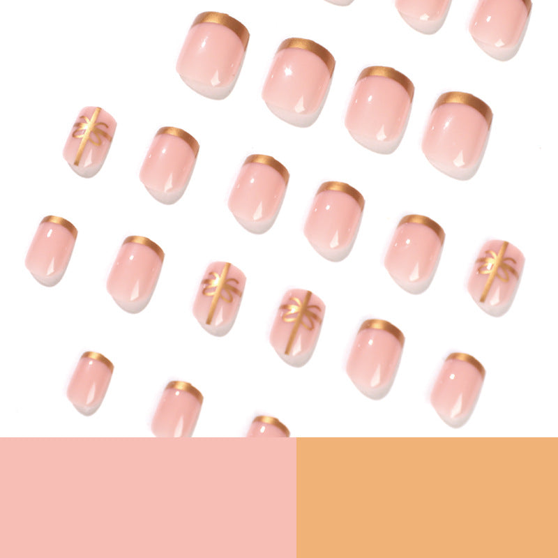 Elegant nail design with gold accents Bowlift