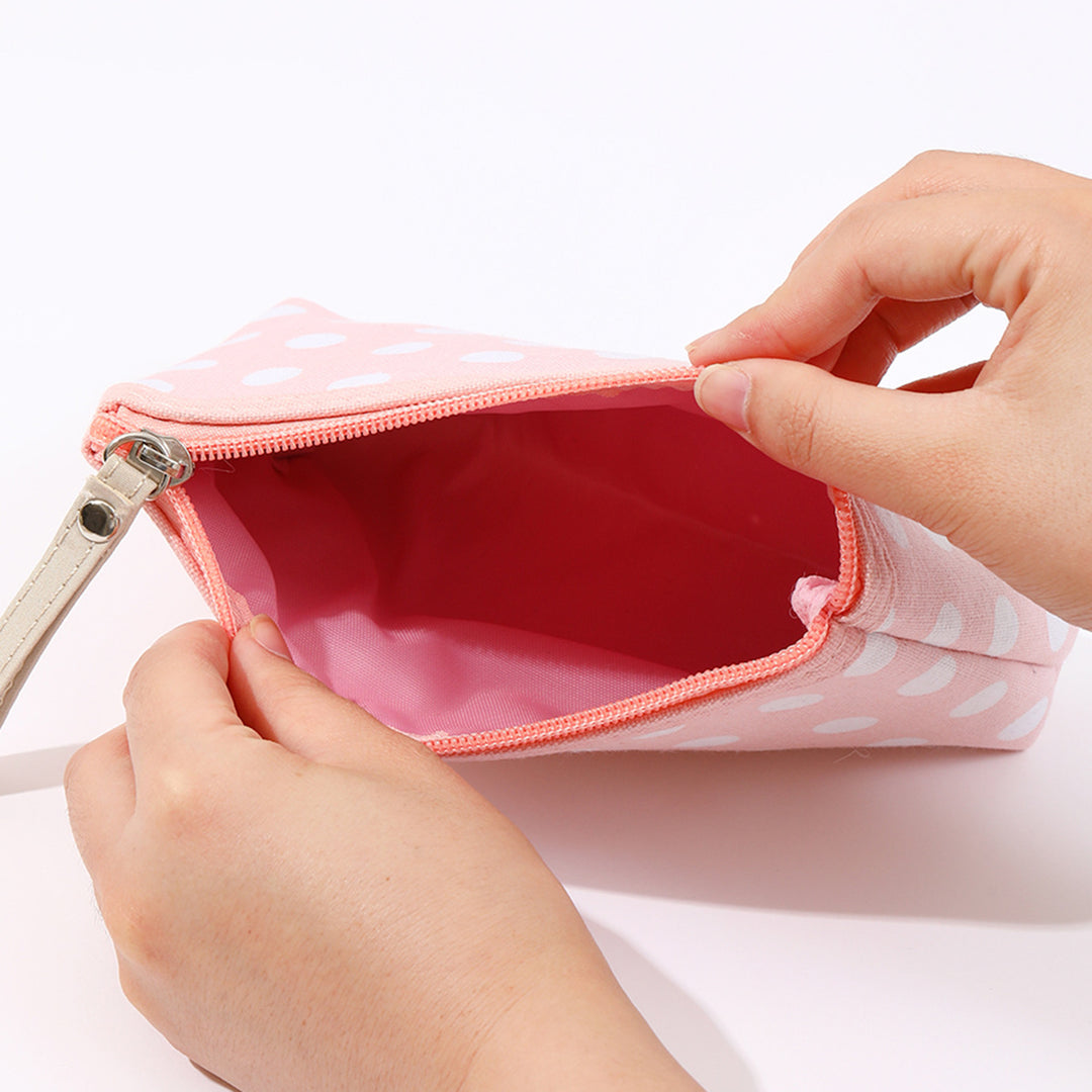 Canvas polka dot cosmetic pouch with zippered faux leather pull Bowlift