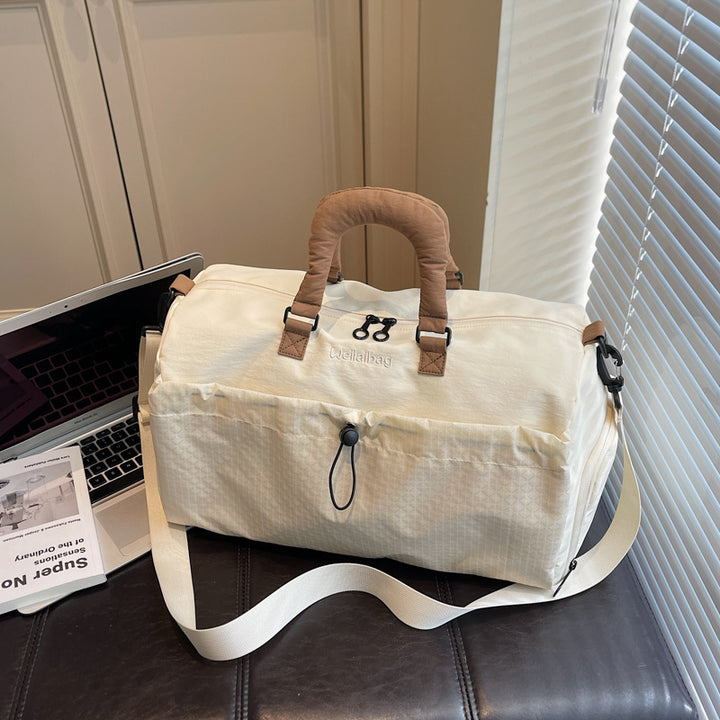 Sporty travel bag with padded carrying handle Bowlift