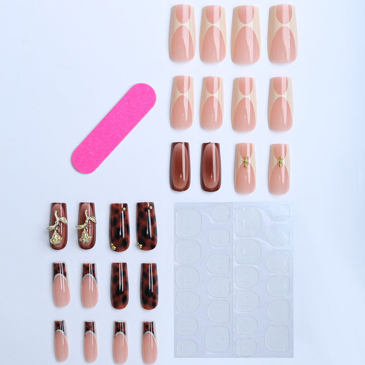 Artificial nails with luxurious embellishments and animalistic design Bowlift