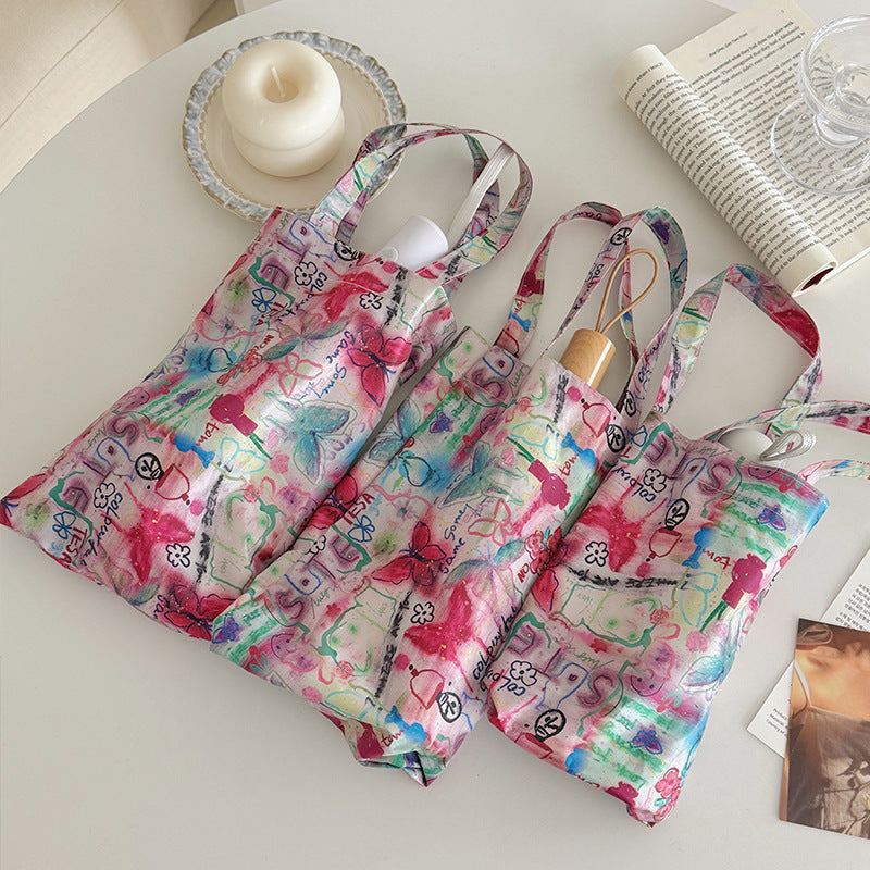 Women’s Foldable Tote Bag with Integrated Umbrella Bowlift