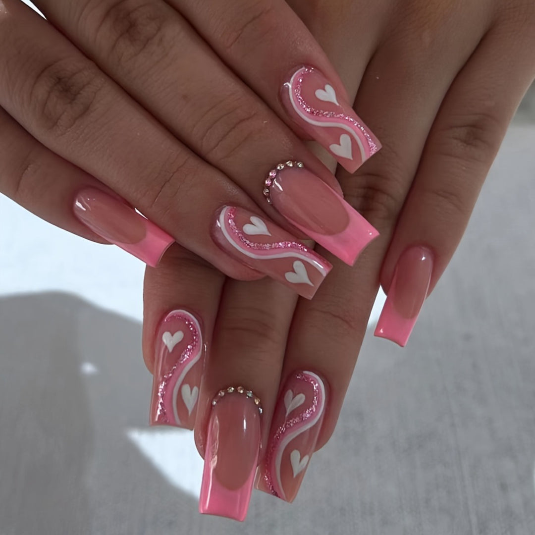 Artificial nail set with romantic heart designs and glamorous accents Bowlift