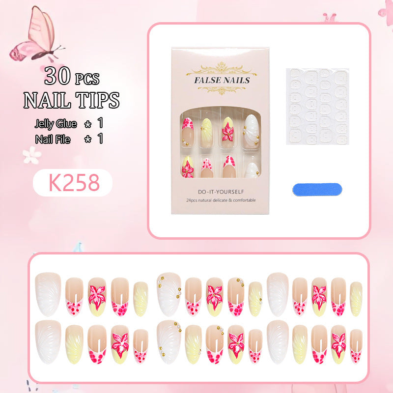 Artificial nail set with floral motifs and elegant embellishments Bowlift
