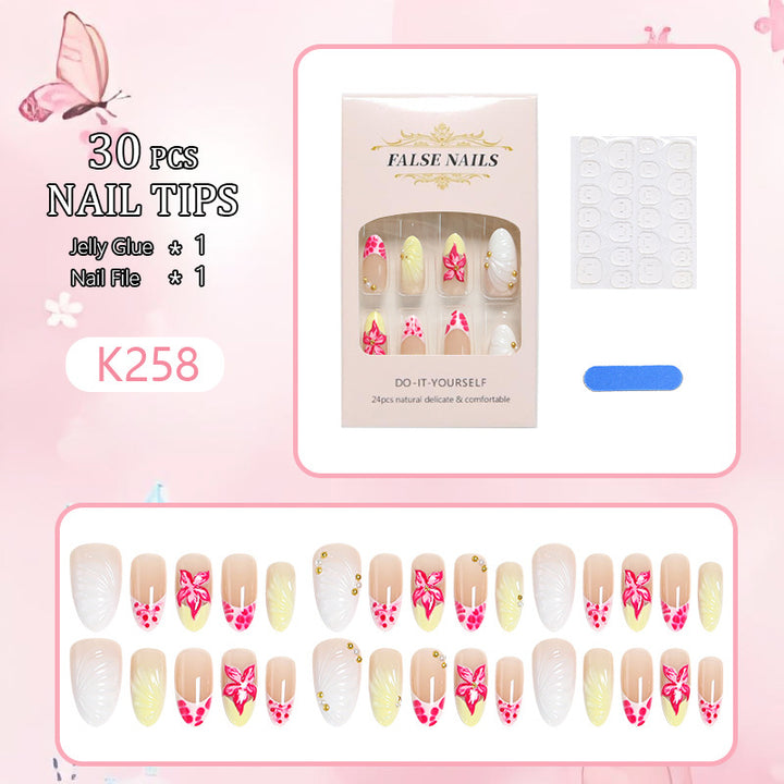 Artificial nail set with floral motifs and elegant embellishments Bowlift