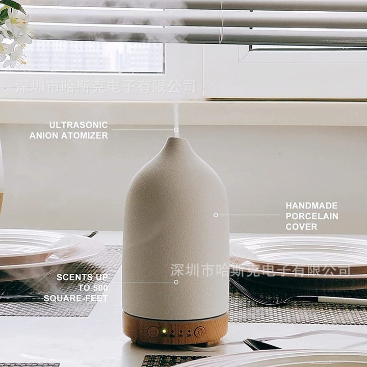 Ultrasonic essential oil diffuser with wood grain base and matte textured ceramic cover Bowlift