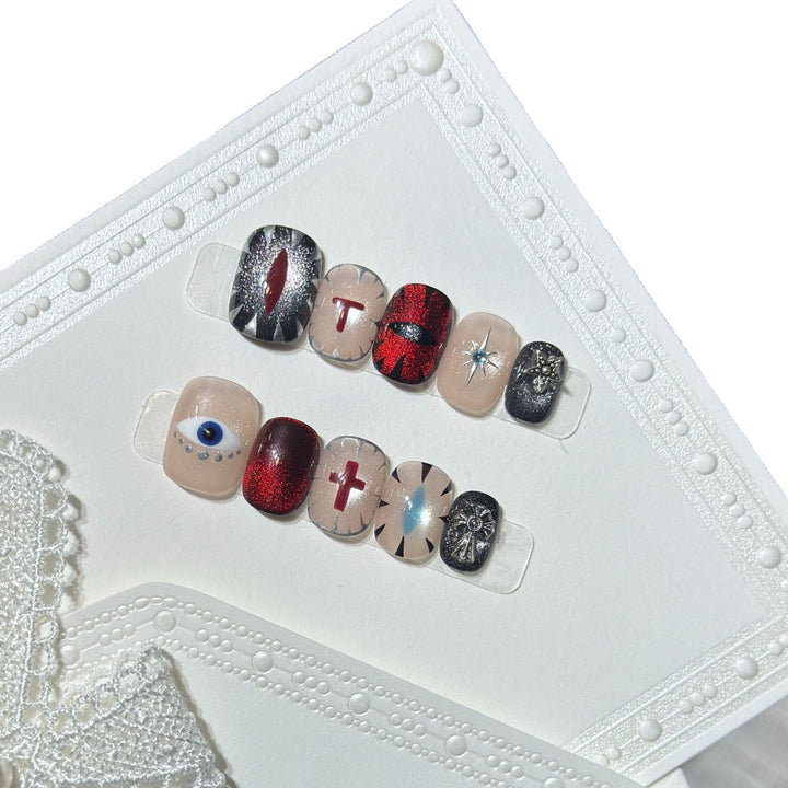 Artistic Press-On Nail Design Set with Unique Symbolic Accents Bowlift