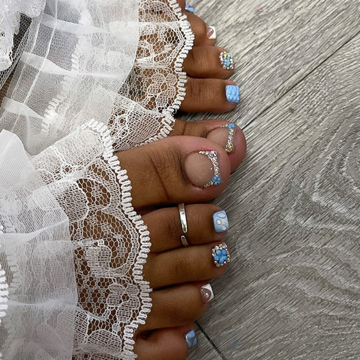 Glamorous artificial nail creation with elegant embellishments Bowlift