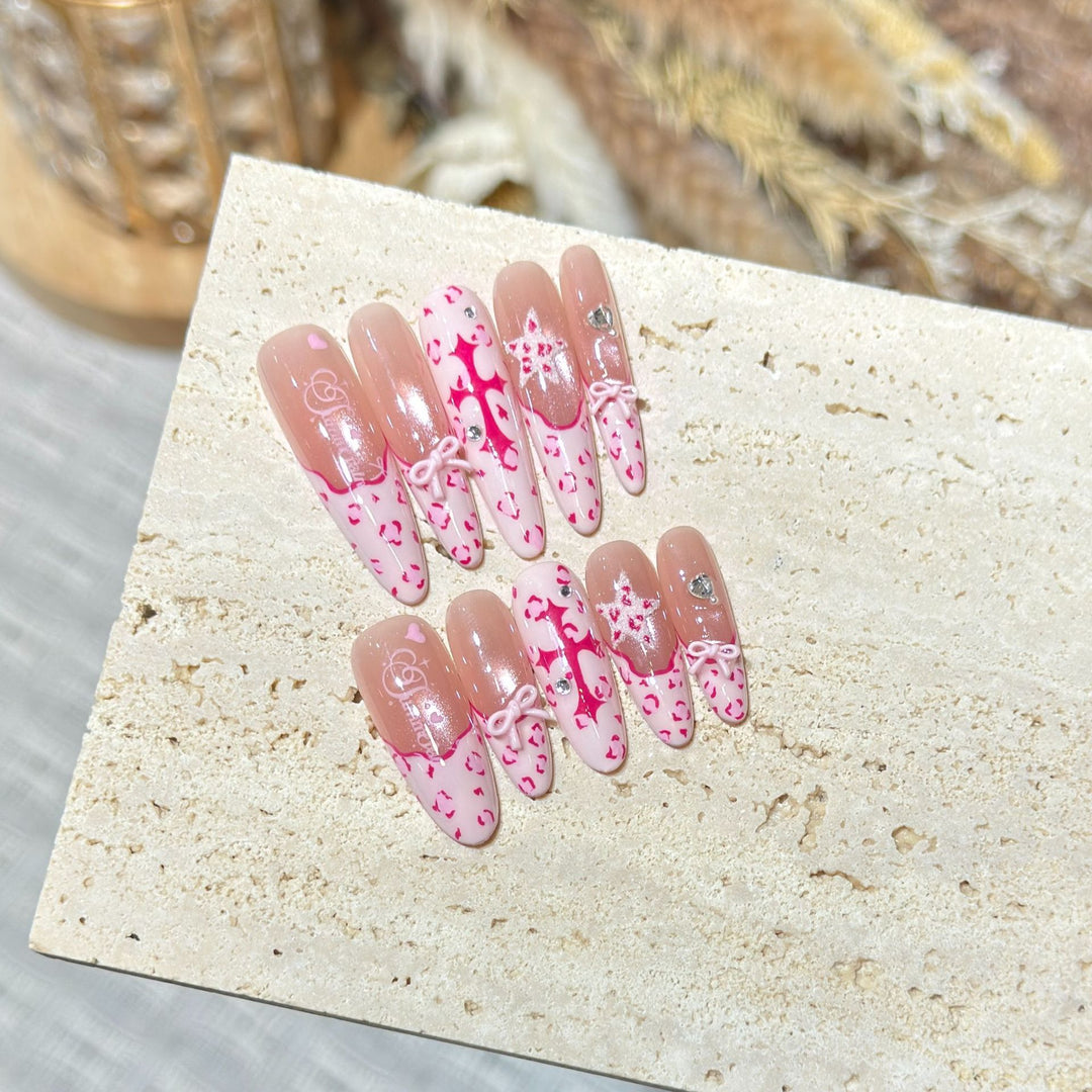 Artistic Stiletto Press-On Nail Set with Heart and Bow Design Bowlift