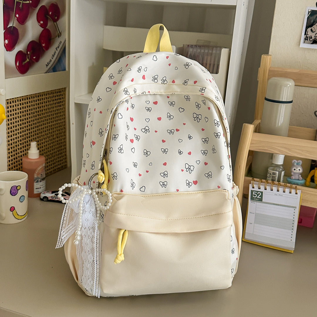 Playful Heart and Bow Patterned Backpack