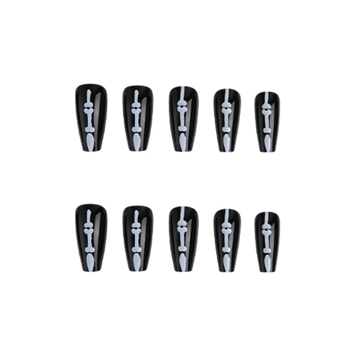 Artistic nail art with skull and bone motif Bowlift