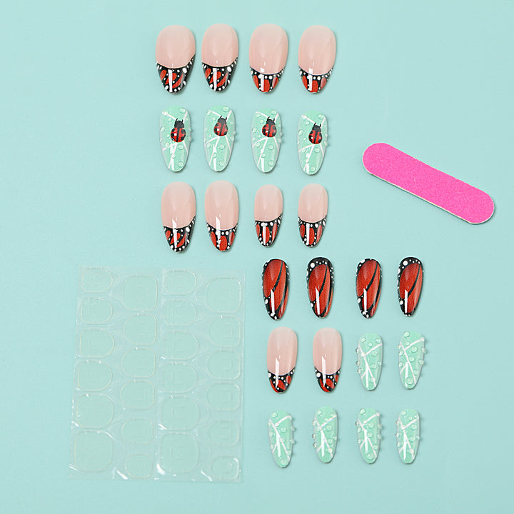 Creative nail art with elaborate butterfly and flower designs Bowlift