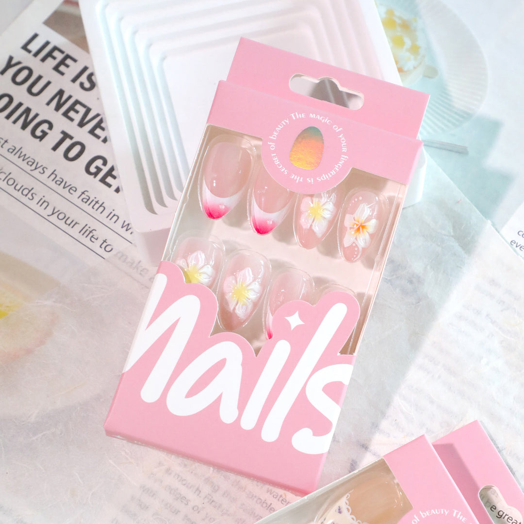 Artistic nail designs with floral accents and soft color gradients Bowlift