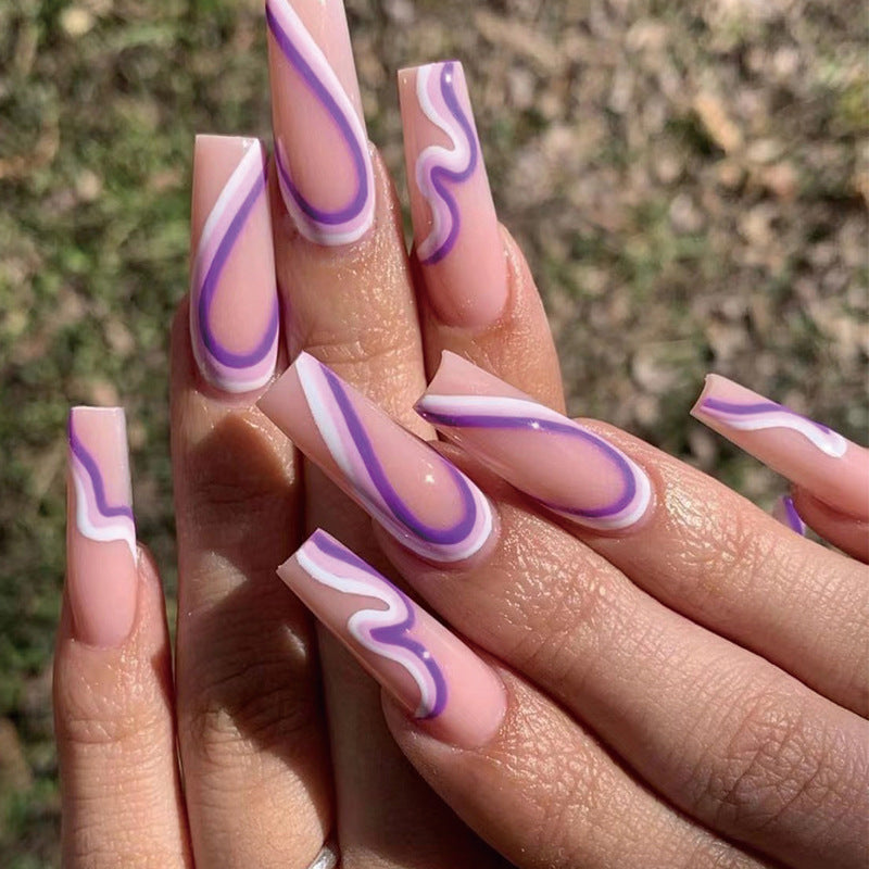 Artful nail extensions with elegant wave pattern Bowlift