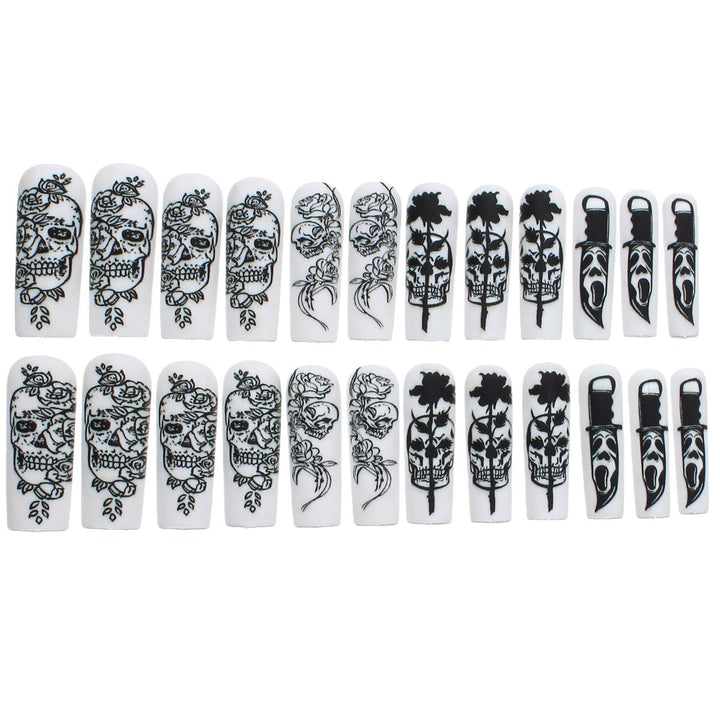 Nail set with spooky skull design and floral motifs Bowlift