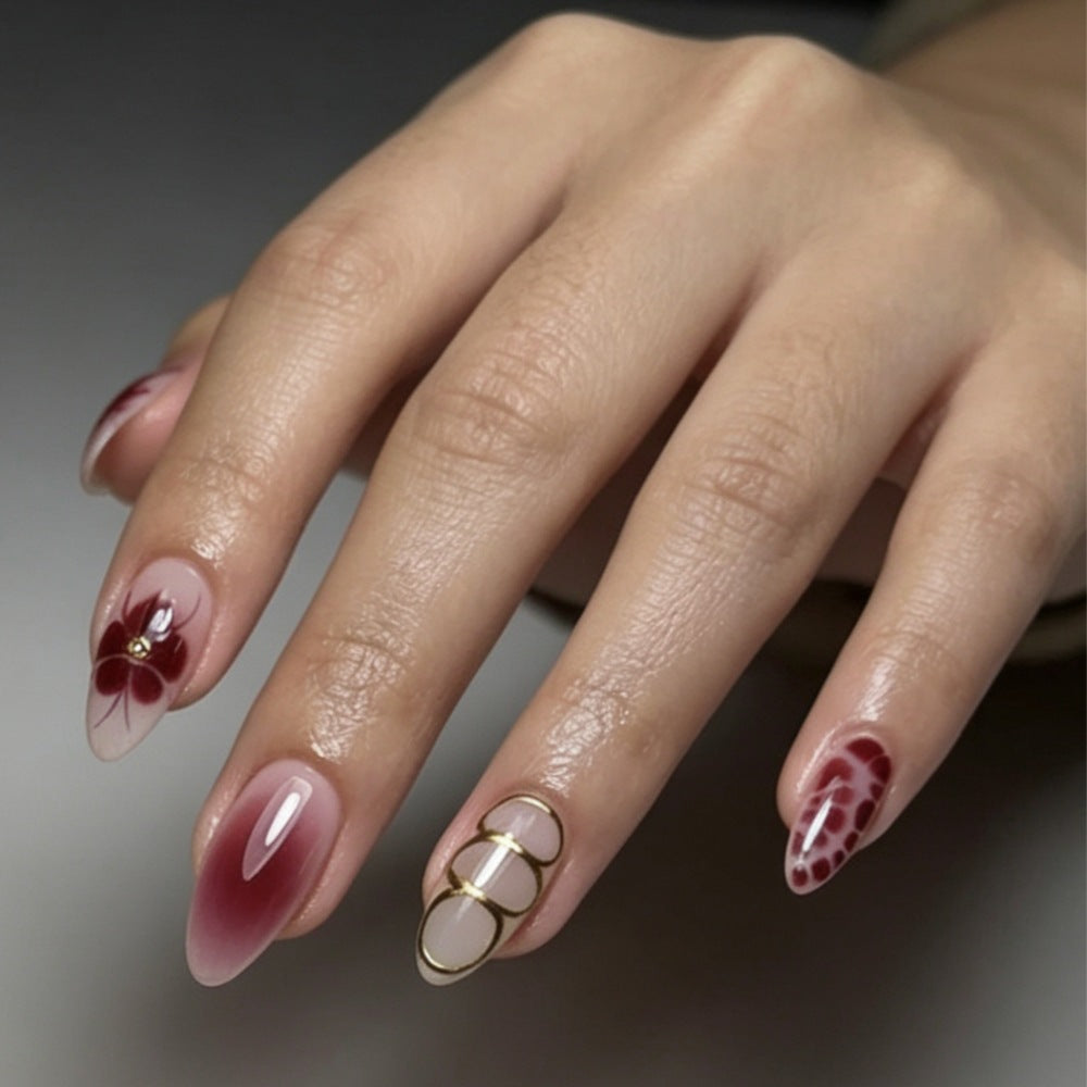 Artificial nails with elaborate flower designs and elegant accents Bowlift