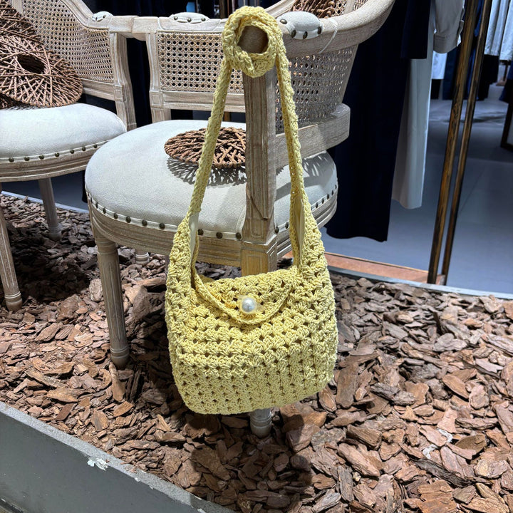 Hand-knotted shoulder bag with bead closure Bowlift