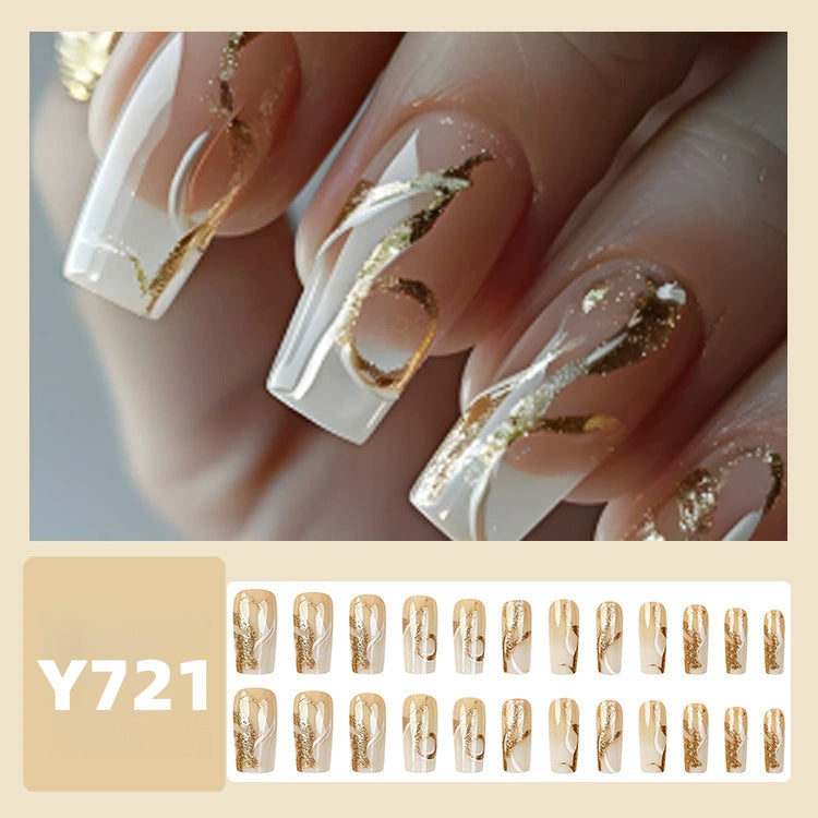 Artificial nails with elegant gold accents Bowlift