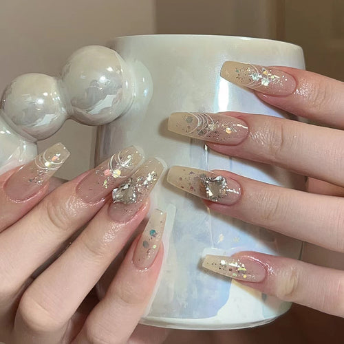 Elegant nail extensions with glitter and flower design Bowlift