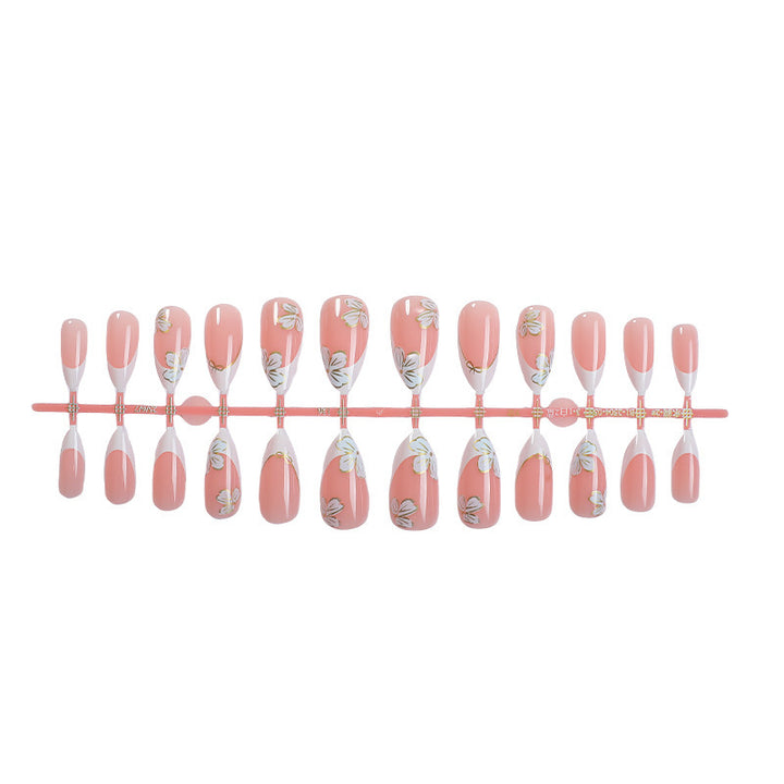 Artificial nail set with elegant flower and French tip design Bowlift