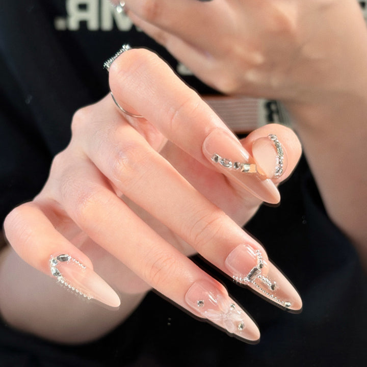 Elegant artificial nails with noble rhinestone embellishments Bowlift