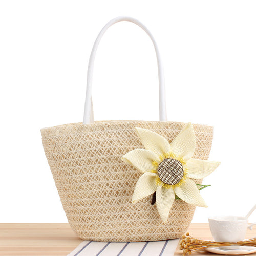 Handbag with floral appliqué Made of natural material Bowlift