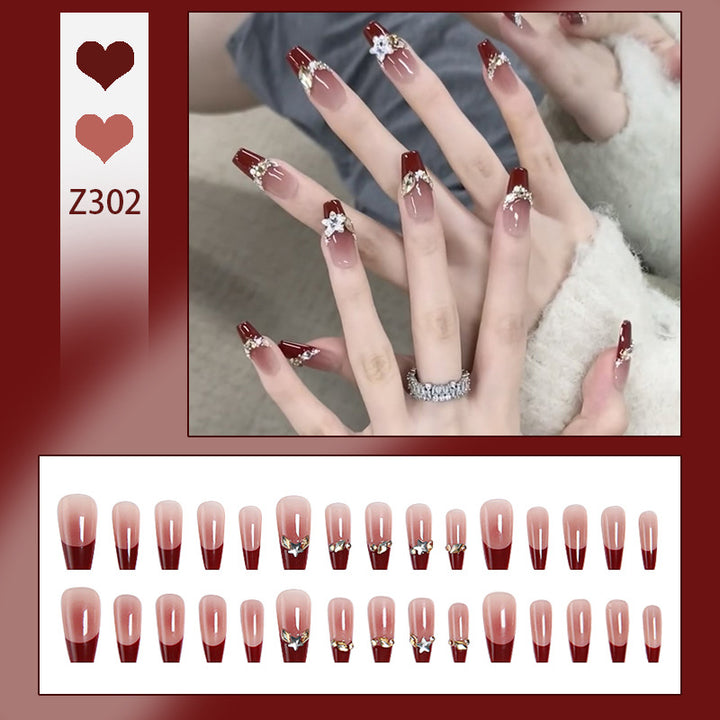 Artificial nail set with elegant glittering accents and romantic design Bowlift