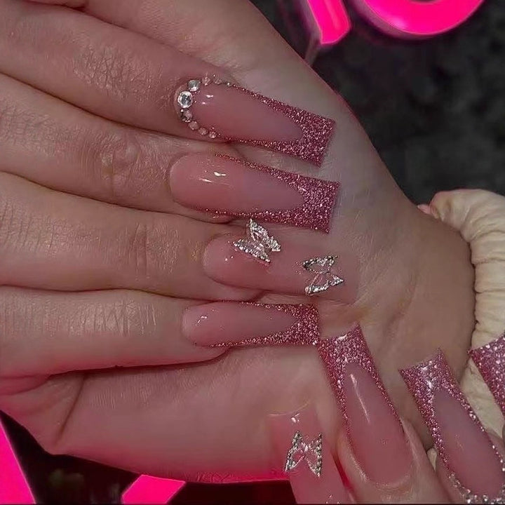Nail art set with sparkling hearts and elegant glitter accents Bowlift