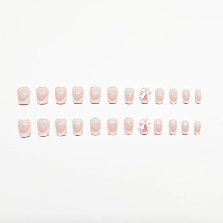 Decorative French Tip Nail Extensions with Bow Accents Bowlift