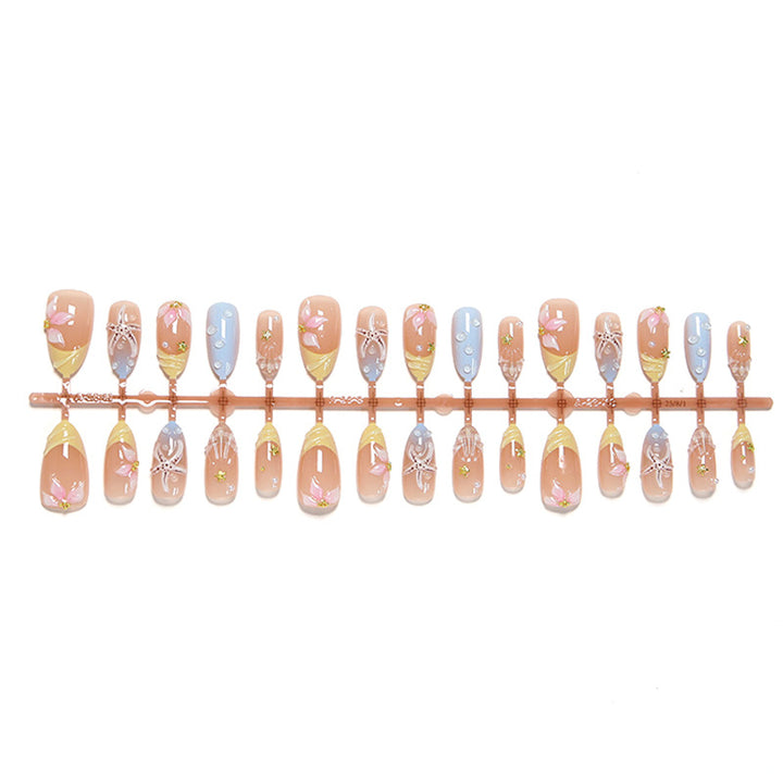 Artificial nail set with floral motifs and glitter accents Bowlift