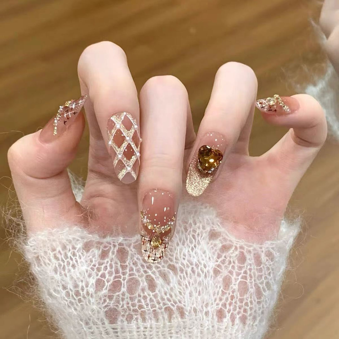 Artificial nails with elegant ombre effect and glitter coating Bowlift