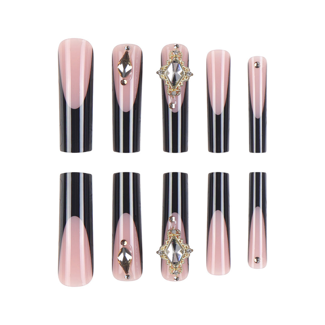 Elegant Stiletto Press-On Nail Extensions with Decorative Gems Bowlift