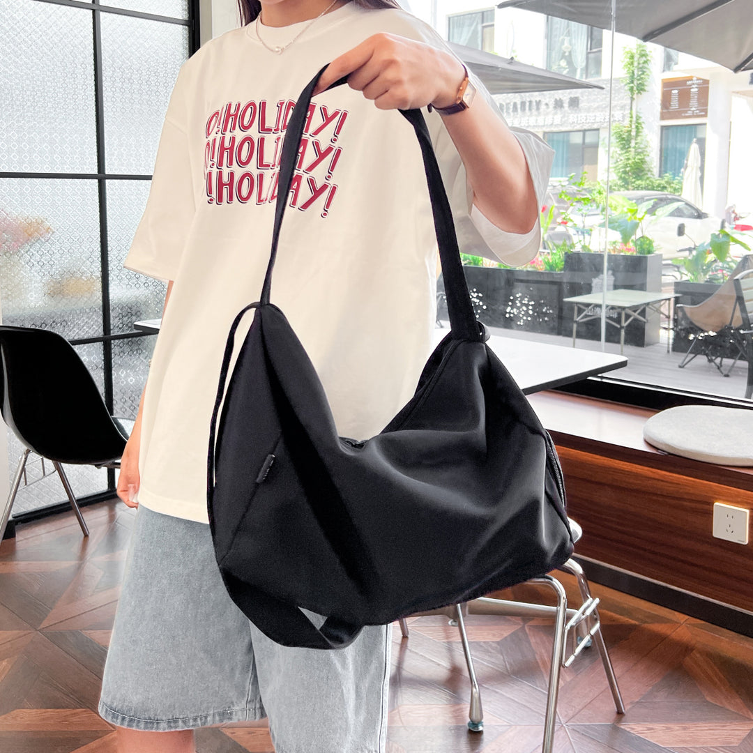 Everyday bag with spacious interior and detachable shoulder strap Bowlift