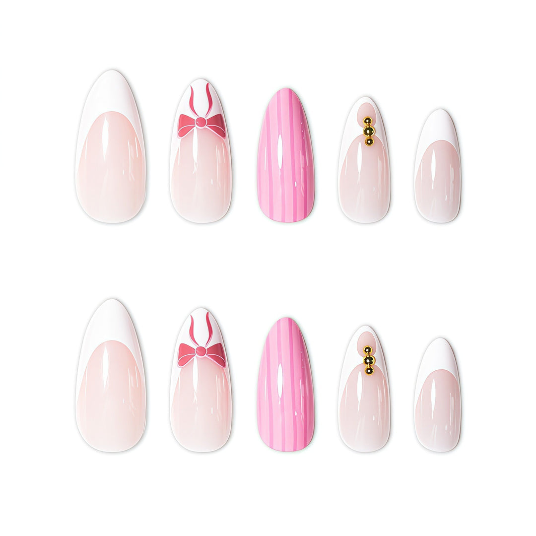 Elegant Stiletto Nail Art Enhancements with Decorative Accents Bowlift