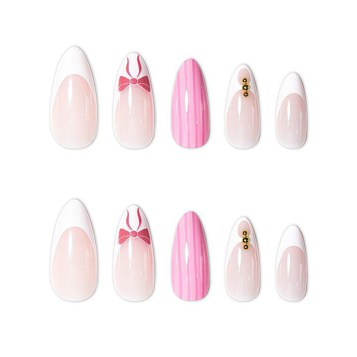 Elegant Stiletto Nail Art Enhancements with Decorative Accents Bowlift