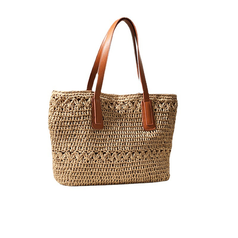 Braided straw bag with sturdy leather handles Bowlift