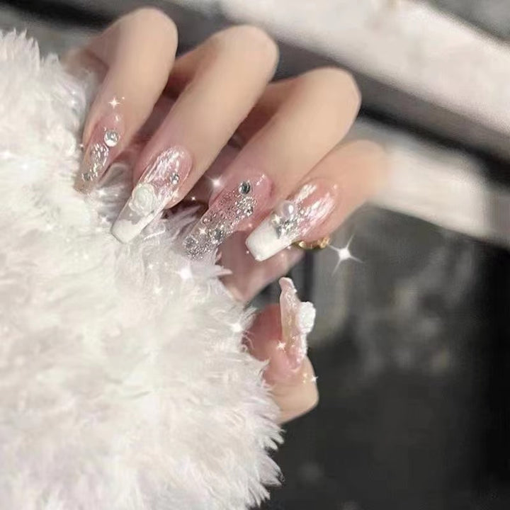 Elegant artificial nails with glitter and flower decoration Bowlift