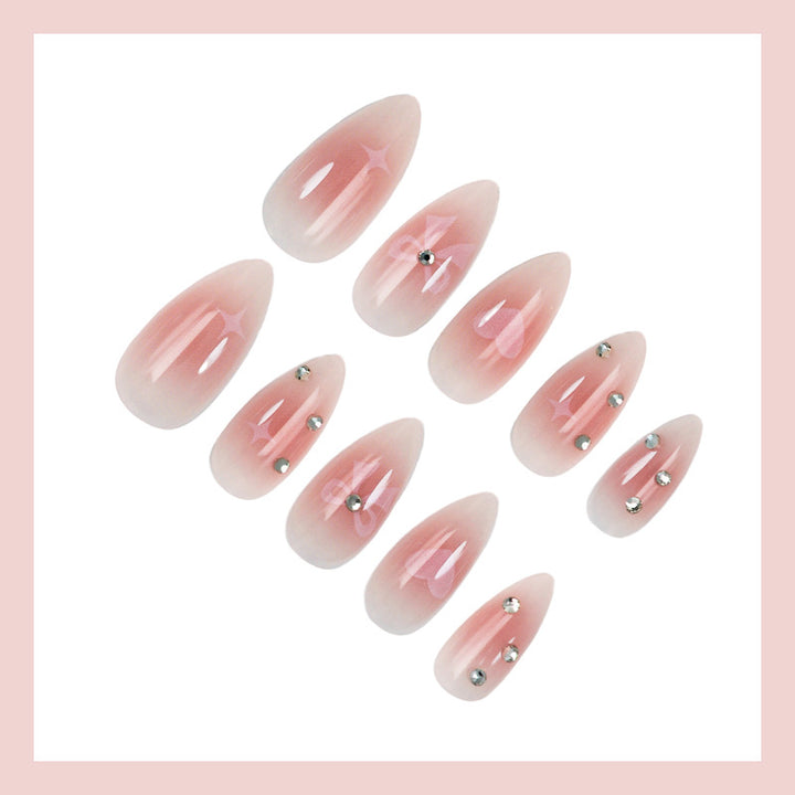 Artificial nail set with romantic heart and bow motifs Bowlift