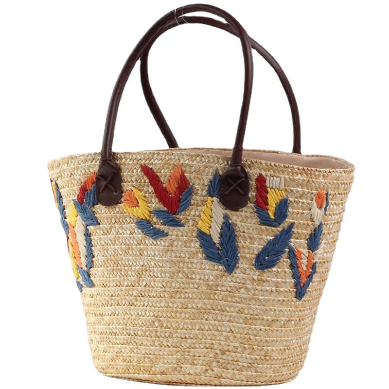 Braided beach bag with colorful embroidery pattern Bowlift