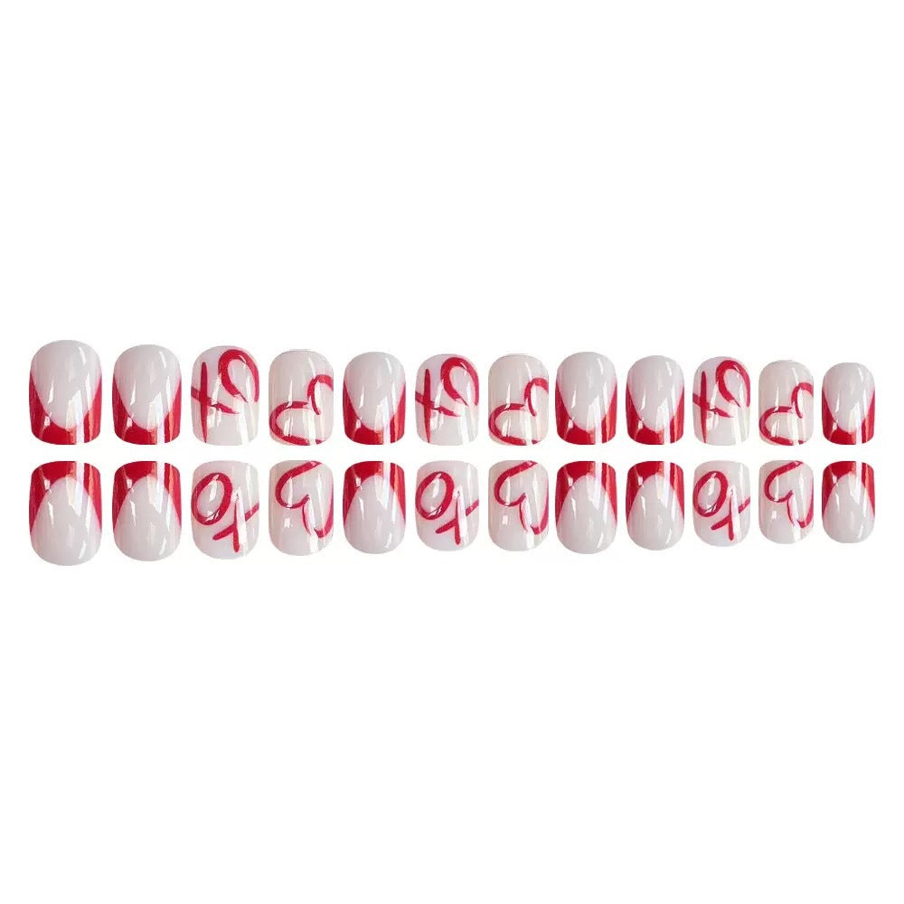 Artificial nail set with romantic heart design and stylish accents Bowlift