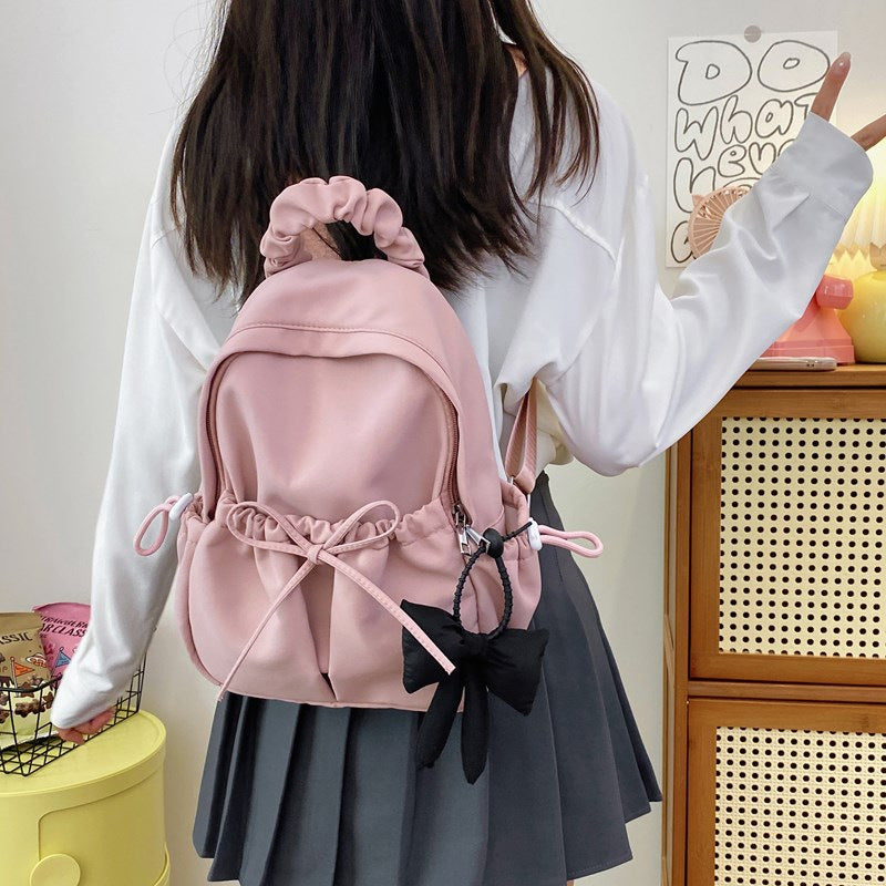 Fashionable backpack with playful details Bowlift