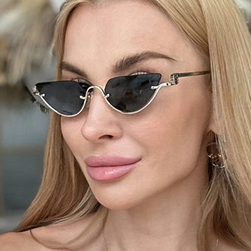 Ladies Cat-Eye Sunglasses with Gold-Colored Metal Frame and UV Protection Bowlift