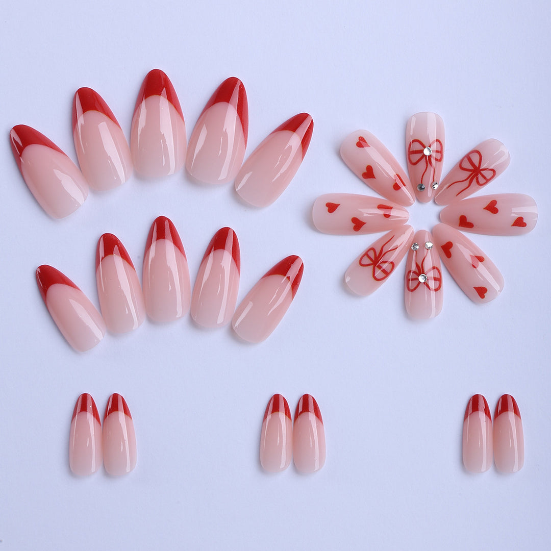Artificial nails with elegant heart designs and glamorous accents Bowlift