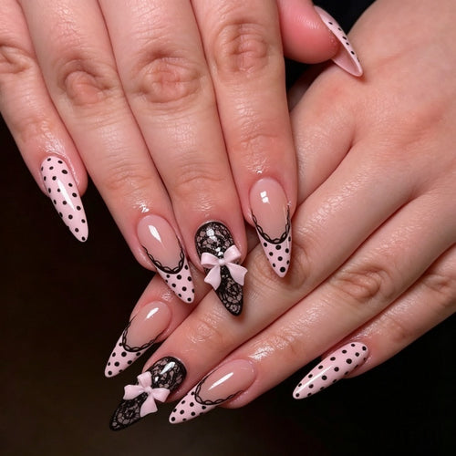 Elegant artificial nails with lace design and bow accents Bowlift