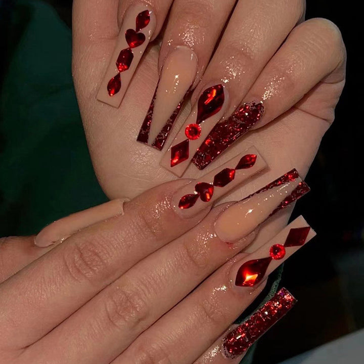 Artfully designed nail extensions with sparkling accents Bowlift