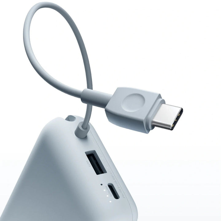 Compact High-capacity portable power bank with integrated USB-C cable and silicone carry loop Bowlift